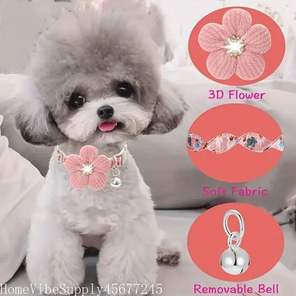 Small dog wearing a pink floral collar with a 3D flower charm and a removable bell