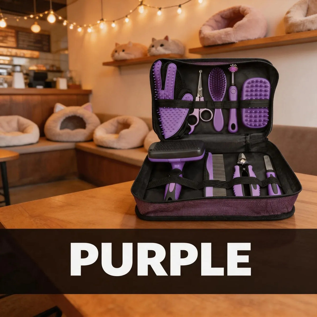 Purple pet grooming kit with brushes combs and scissors in a travel case
