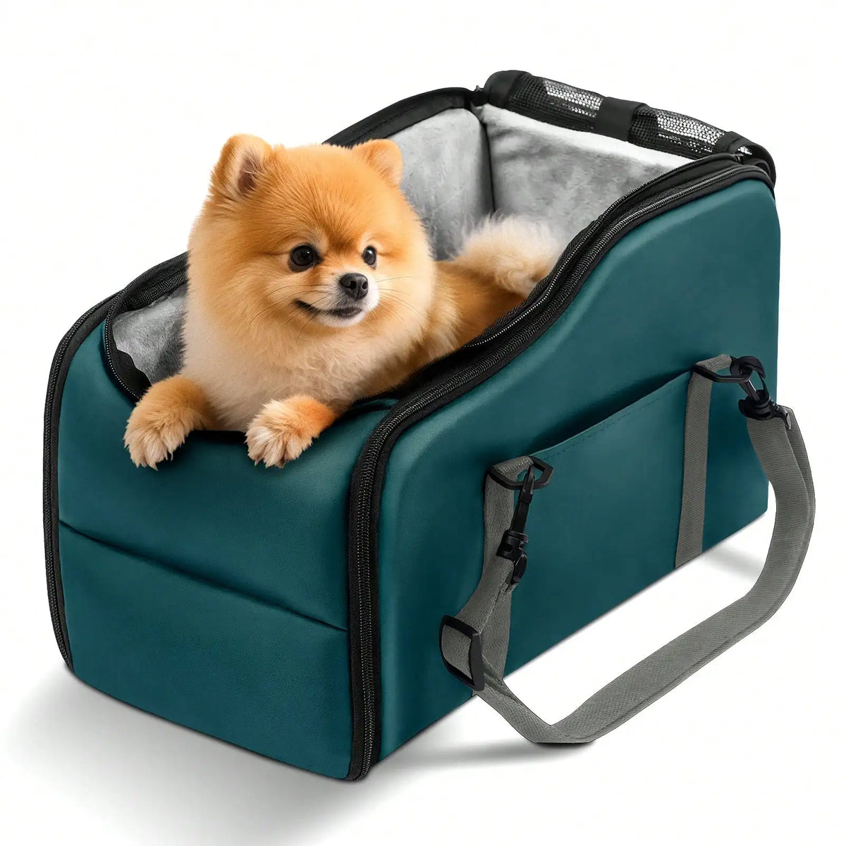 Small dog resting inside a teal center console pet car seat and travel carrier with a plush liner
