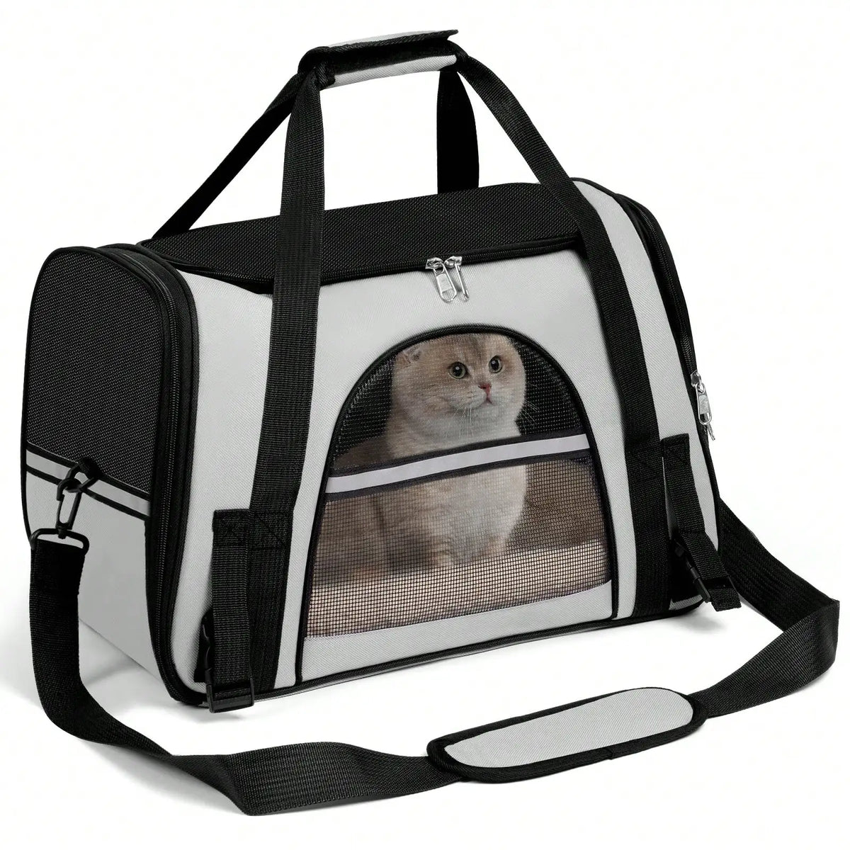 Airline-approved foldable pet carrier with breathable mesh and shoulder strap containing a cat