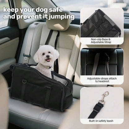 Small white dog in a black car seat carrier with non-slip base, adjustable headrest straps, and built-in safety leash
