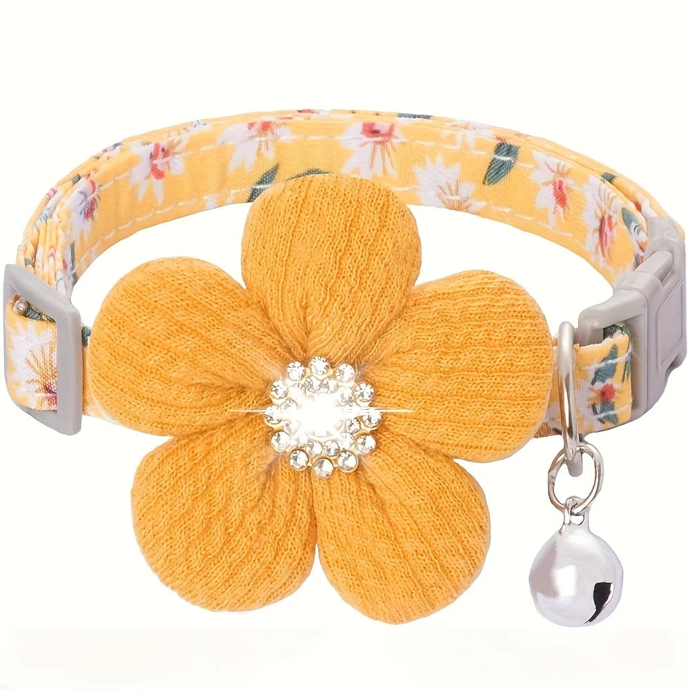 Yellow floral pet collar with a large 3D fabric flower charm featuring a crystal center and a hanging silver bell