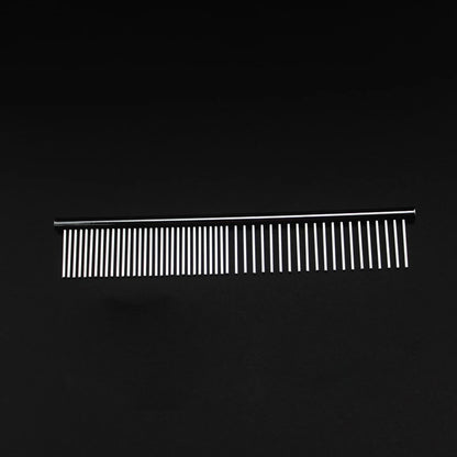 Metal grooming comb with fine and coarse teeth on a black background