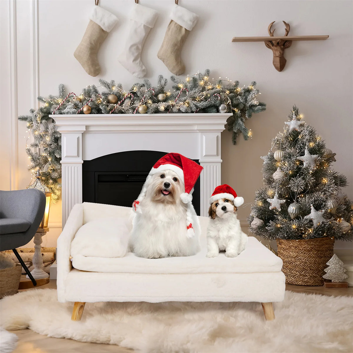 Two dogs wearing Santa hats sitting on a Nordic elevated pet sofa bed with a waterproof cushion and wood legs