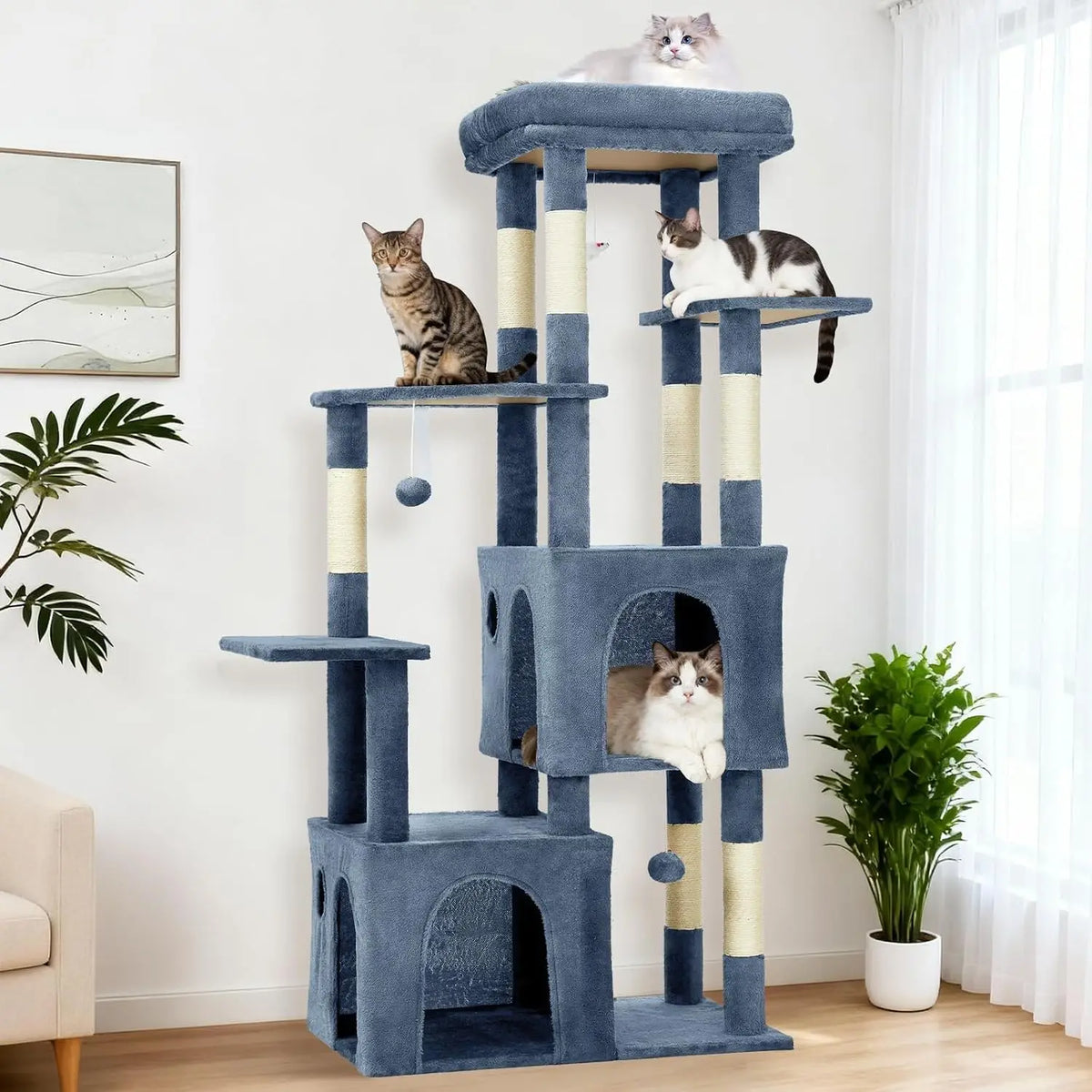 Blue multi-level cat tree with sisal scratching posts and two enclosed cat condos