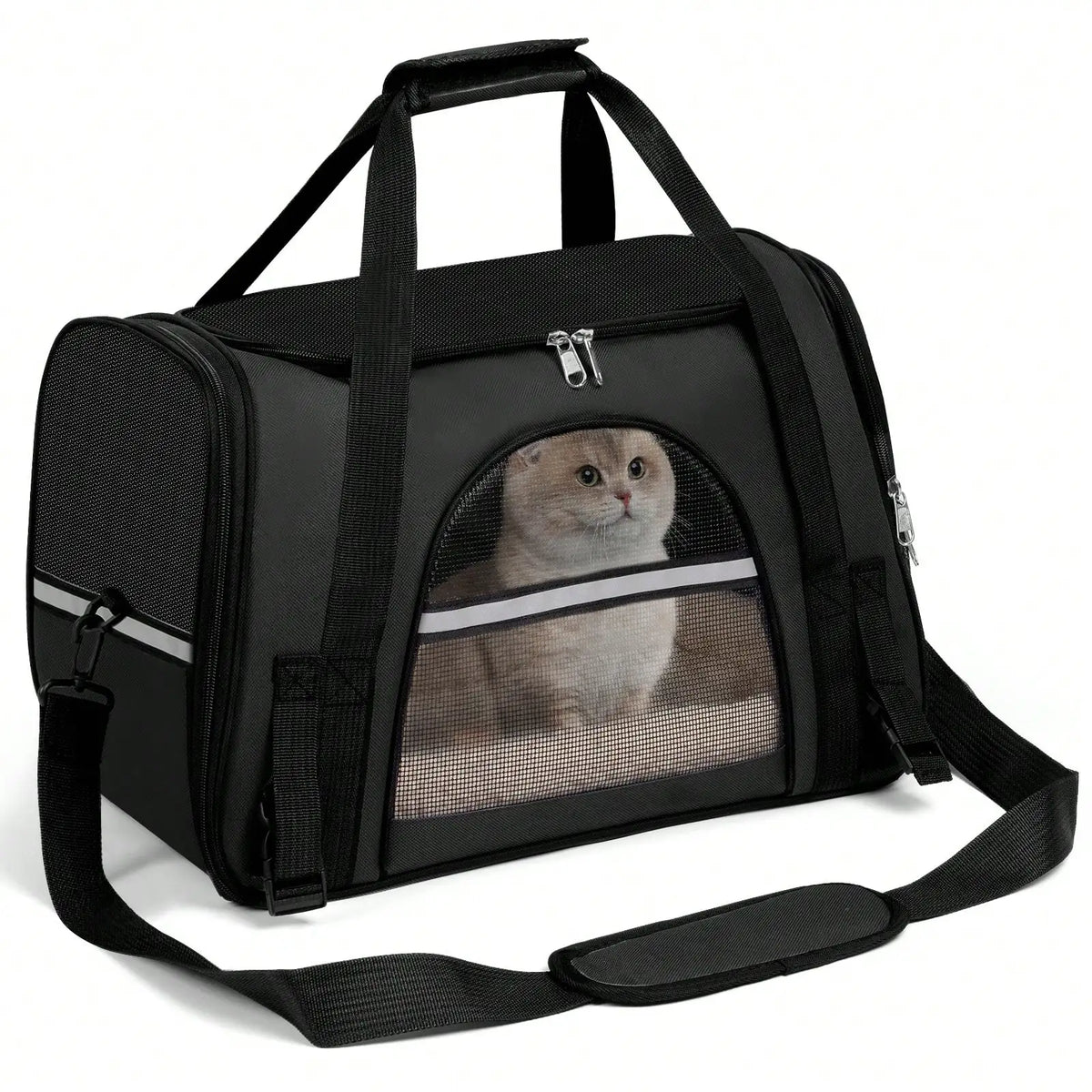 Cat sitting inside a black soft sided pet carrier with mesh windows and shoulder strap