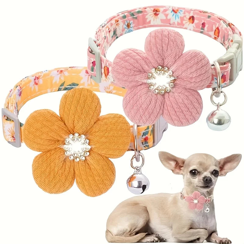Two floral pet collars with 3D flower charms and bells shown with a small dog wearing one