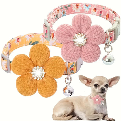 Two floral pet collars with 3D flower charms and bells shown with a small dog wearing one