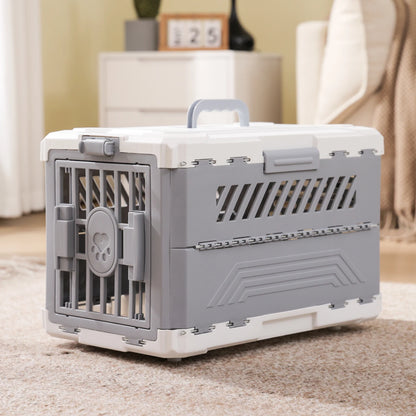 Collapsible grey and white plastic pet carrier with a front door and ventilation slats